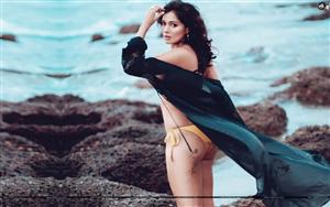 Megha Gupta looks alluring with her head turning pose